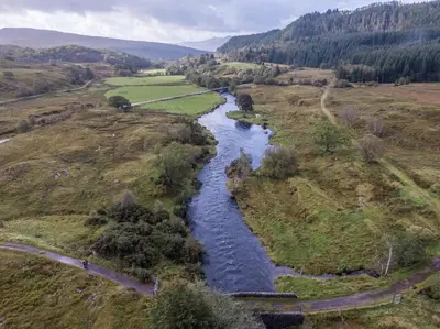 an aerial view of a river in a field at The Billiard Room Flat
