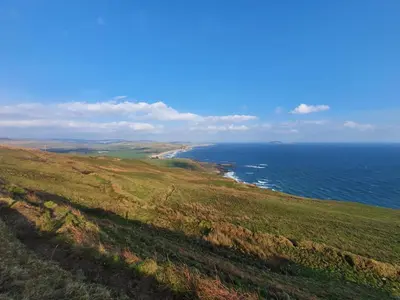 an aerial view of the ocean and a beach at 3 Bed in Clachan oc-h32242 in Clachan
