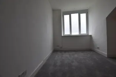 an empty room with a window in an empty building at The Cliff Retreat in Wemyss Bay