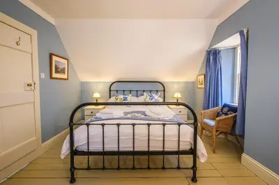 a bedroom with a bed in a room at Craigendarroch No 2 in Acharn