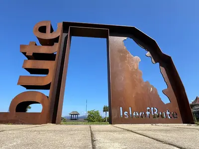 a large sculpture with a door in the middle at Hide-a-While in Rothesay