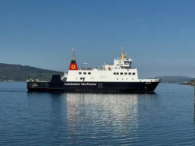 a large ferry boat sitting in the water at Hide-a-While in Rothesay
