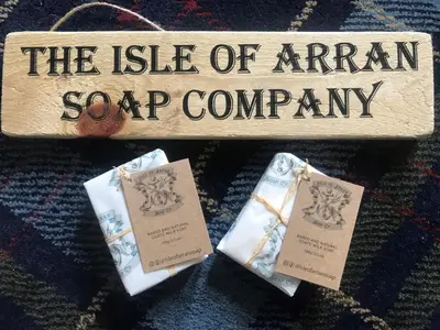 a sign that reads the isle of arran soap company at Cnocanreoch Farm Glamping in Kilmory