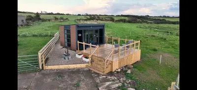 an overhead view of a tiny house in a field at Cnocanreoch Farm Glamping in Kilmory