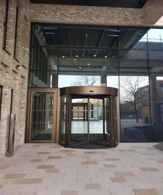 an entrance to a building with two revolving doors at victoria resedent in Moffat