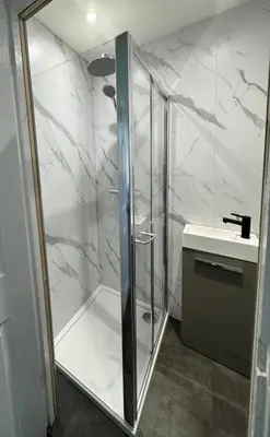 a bathroom with a shower and a sink at Modern and stylish 3 bedroom 2 bathroom west end house with Free WiFi and parking in Scotstoun West Station