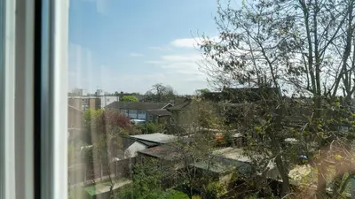 a view of a city from a window at 3 bedroom cosy apartment 20 mins to Centre in Moffat