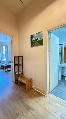 an empty room with a room with a table and a room at Glasgow One Bedroom Flat close to city centre and all amenities in Glasgow
