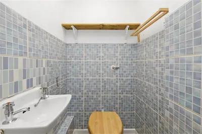 a bathroom with a toilet and a sink at Haymarket Edinburgh Flat Sleeps 4 in Edinburgh