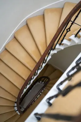 a close up of a spiral stair case at Elegant Town house in Edinburgh in Moffat