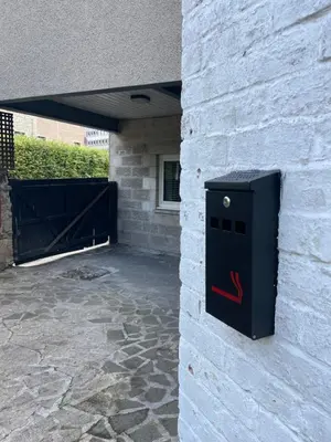 a black box on the side of a building at Foundry Street Apartment 1 - Dunfermline City Centre in Dunfermline