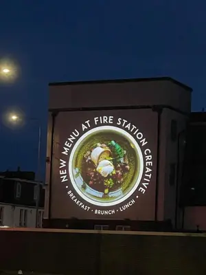 a large sign on the side of a building at Foundry Street Apartment 1 - Dunfermline City Centre in Dunfermline