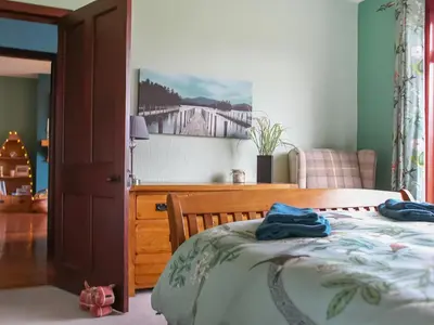 a bedroom with a bed and a dresser at Bendhu in Mill of Fortune