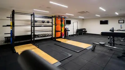 a fitness room with two at SOAB Residence in Hamilton