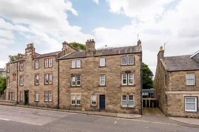 an old brick building on the side of a street at Double Edinburgh Homestay in Edinburgh