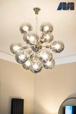 a chandelier hanging from a ceiling in a room at 3Bed Sleeps6 EdinburghCityCentre in Edinburgh