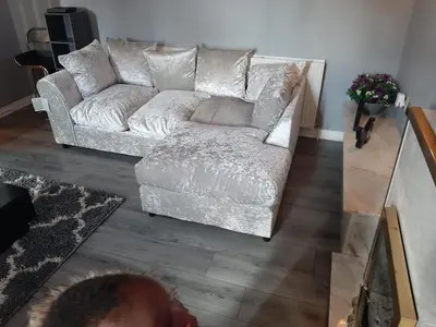 a white couch sitting in a living room at Newly renovated & furnished luxury bedroom in Kirkliston