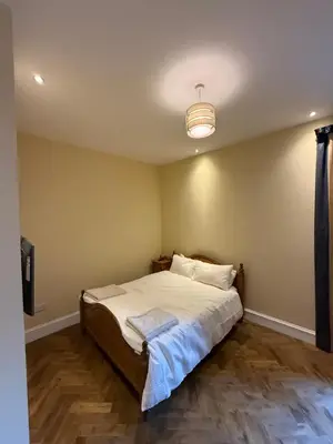 a bedroom with a bed and a television in it at Entire rental in Edinburgh City Centre in Edinburgh