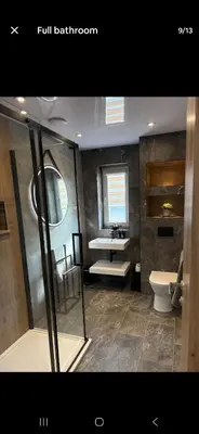 a bathroom with a sink and a toilet at The Wee Bothy in Oban