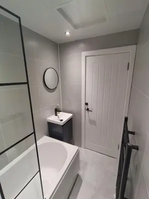 a bathroom with a sink and a toilet and a shower at Millburn Chalet in Inverkip