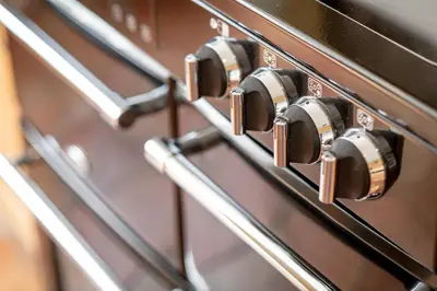 a close up of a stove top oven withobs at Kilmore Paws and Relax in Comrie