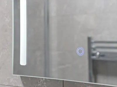 a mirror in a bathroom with a door with a button at Ludgate 2 Bedroom Apartment - Alloa in Alloa
