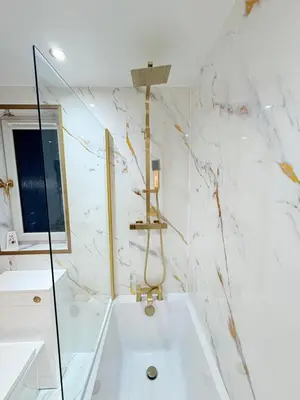 a white bathroom with a tub and a sink at F2 2BR Free Parking Walk Dis City in Glasgow