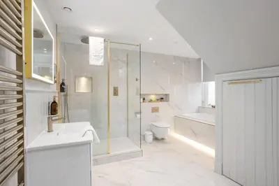 a bathroom with a shower and a sink and a toilet at Central Edinburgh Prime Luxury 3 bed in Edinburgh