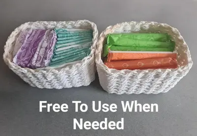 two baskets filled with different colored cloths at 2-Bedroom Home Away From Home in Glasgows' East End with FREE Parking in Mount Vernon
