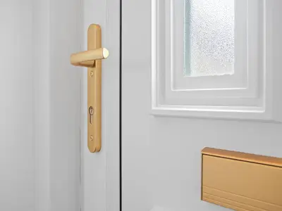 a white door with a wooden handle on it at Mollison 2 Bedroom Apartment - Harthill in Harthill