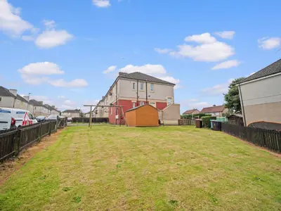a large yard in front of a house at Mollison 2 Bedroom Apartment - Harthill in Harthill
