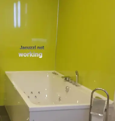 a bath tub with a sign that reads javascript not working at My Glasgow House Bishopbriggs in Bishopbriggs