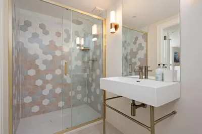 a bathroom with a sink and a shower at Escape to Serene Georgian Estate, near Edinburgh in Ratho