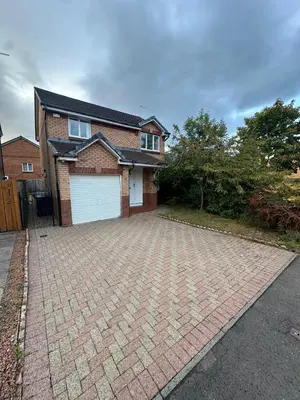 a brick driveway in front of a brick house at Tartan Nest- Entire house- Sleeps 8 guests in Mansewood