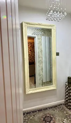 a mirror on a wall in a room at Modern 4-Bed Family Home in Solihull in Moffat