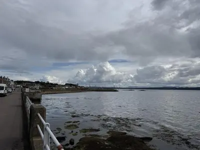 a view of a body of water with a cloudy sky at Watt-A-View in Limekilns