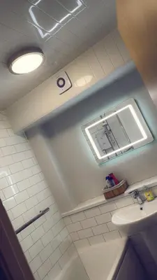 a bathroom with a sink and a window at The friendly place in Glasgow