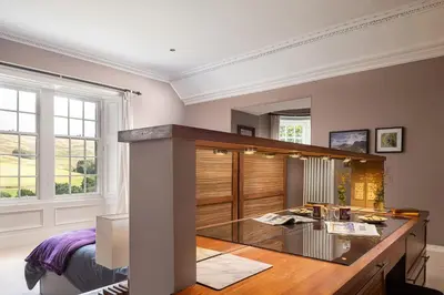 a room with a desk with a glass counter at Quarter House in Peebles