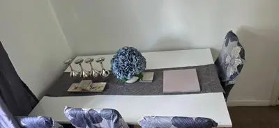 a white table with a bunch of items on it at 3 bedrooms home away from home in Uphall