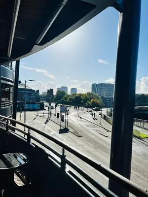a view of a city street from a bus at City Centre Apartment in Glasgow