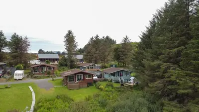 an aerial view of a homes in a forest at Scarba in Oban