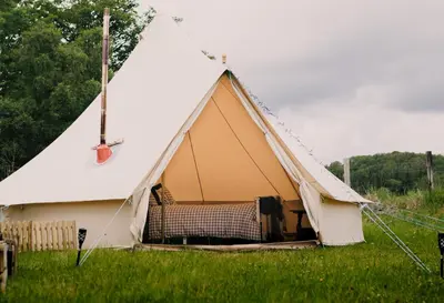 a large bell tent in a field of grass at Daley Croft Boutique Glamping in Taynuilt