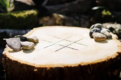 a cake with rocks on top of a tree stump at Daley Croft Boutique Glamping in Taynuilt