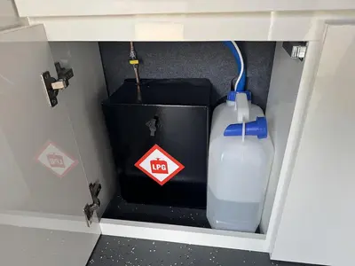 a lego drawer with a jug of water in it at Campervan Scotland, Ben Roamer in Dunblane
