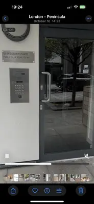 a close up of a microwave door with a window at One Bedroom Apartment in Greenwich Peninsula in Moffat
