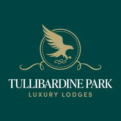 a logo for auryury lodges with an eagle on it at Luxury Lodge