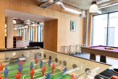 a room with a table and ping pong balls at For Students Only Martha Street Glasgow in Glasgow