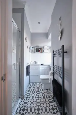 a bathroom with a toilet and a sink and a shower at Stay Torrance-Village Home Near Glasgow in Glasgow