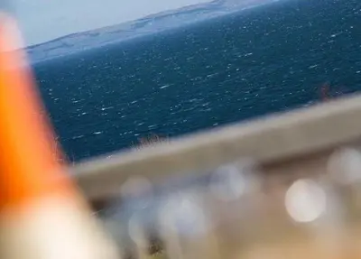 a view of the ocean from a laptop computer at Spacious holiday home with stunning sea views in Whiting Bay