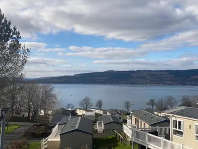 a view of a town with houses and a lake at Wemyss Bay Mapleton Elite in Wemyss Bay
